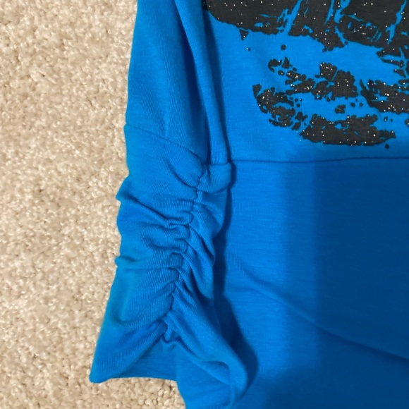 Super cute one shoulder top. Size child large. Excellent condition. - Picture 2 of 7